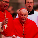 Cdl Roger Mahony (left) and Theodore McCarrick (center) during the 2013 pre-Conclave meetings